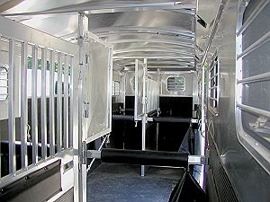 The inside of our four horse, head-to-head trailer can be configured to 