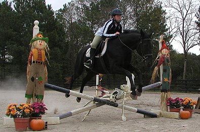 Kimberly Horne and Charlie jump over "Bones". October 22, 2005