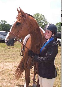Our Boy Darcy and Jessica at a horse show