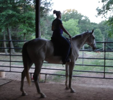 Sam and Cecile riding with only a halter and lead rope.