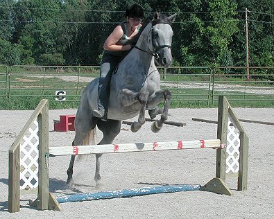 Amy jumps "Smokey" bareback. - September 2005
