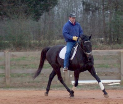 Wiseguy's Out and his trainer.