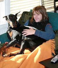 Miss Sydney, a member of our Doberman security team, is on the job holding down visitor Katie Mooradian. January 21, 2008