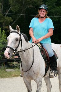 Kelly Fortner's first ride on her new ex-race horse, Cobb County. - August 24, 2007
