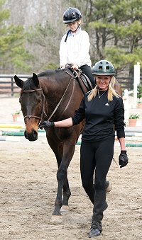 OTTB - K O River Crossing has graduated to lead line pony for our young visitor Maddie from Michegan. 