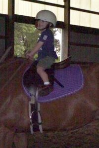 Three year old Josh rides an off-the-track Thoroughbred for the first time. 