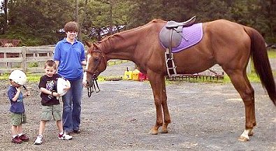 Dr. Kenny Winn has become a "family" horse with husband Adam and sons Noah and Josh all riding this OTTB.