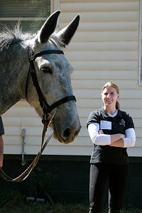 Paula Gunnels eyes a Joe Bear look alike who attended the clinic.