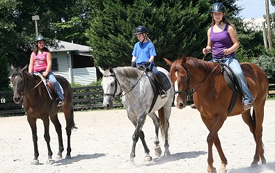 Future Olympic riders! Three young girls ages 10 to 13 learn to ride on off-the-track Thoroughbreds. August 10, 2008