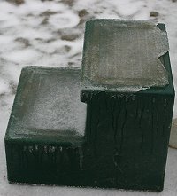 Ice coats the mounting block