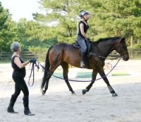 Niki Rawls and Era of Chanago take a lesson with Vera Vogt.