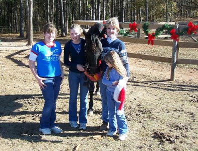 Charlie has a whole bunch of people to love on him. December 2005