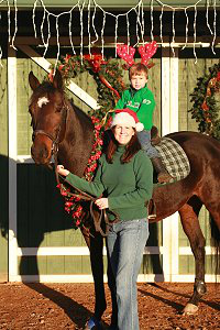 OTTB and former Bargain Barn horse, Stevie Loverboy, gives his little boy a ride. December 18, 2007