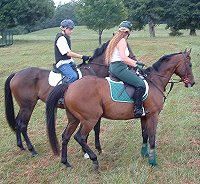 Mom Lise coaching her son Alex on his first ride away from the farm.