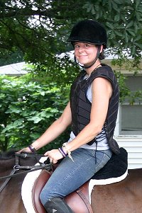 Bits & Bytes Farm intern, Jennifer Gralow riding OTTB Finder's Chance.